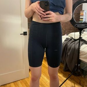 Large navy Girlfriend Collective bike shorts
